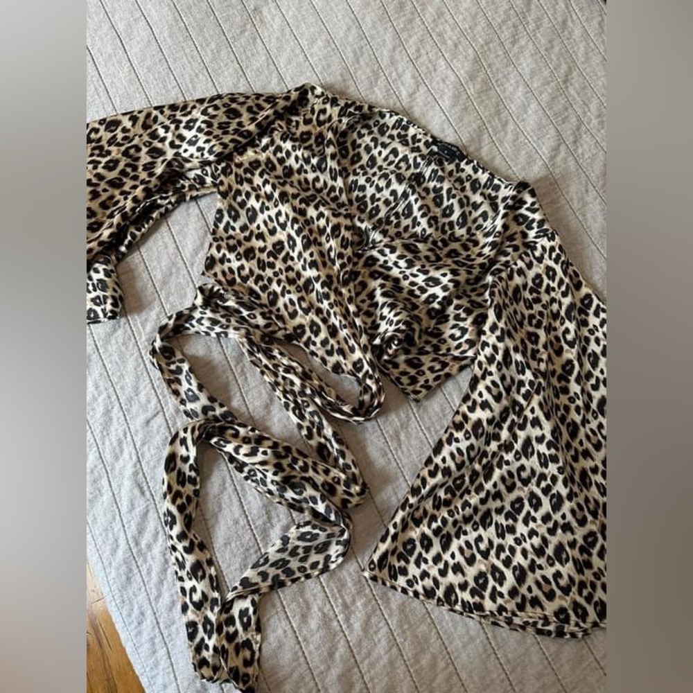 Cheetah print cropped top with bell sleeves